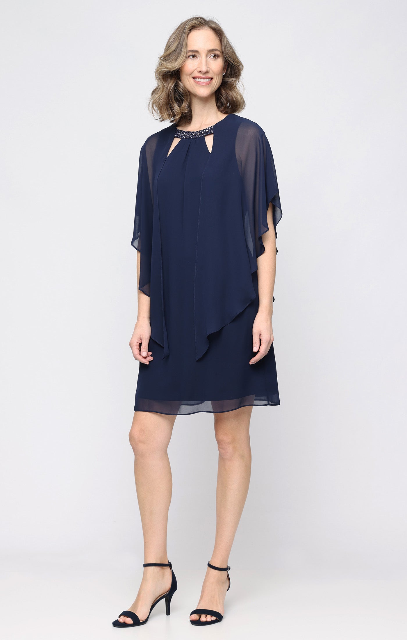 Short Shift Dress With Embellished Cutout Neckline and Capelet Cascade Sleeves