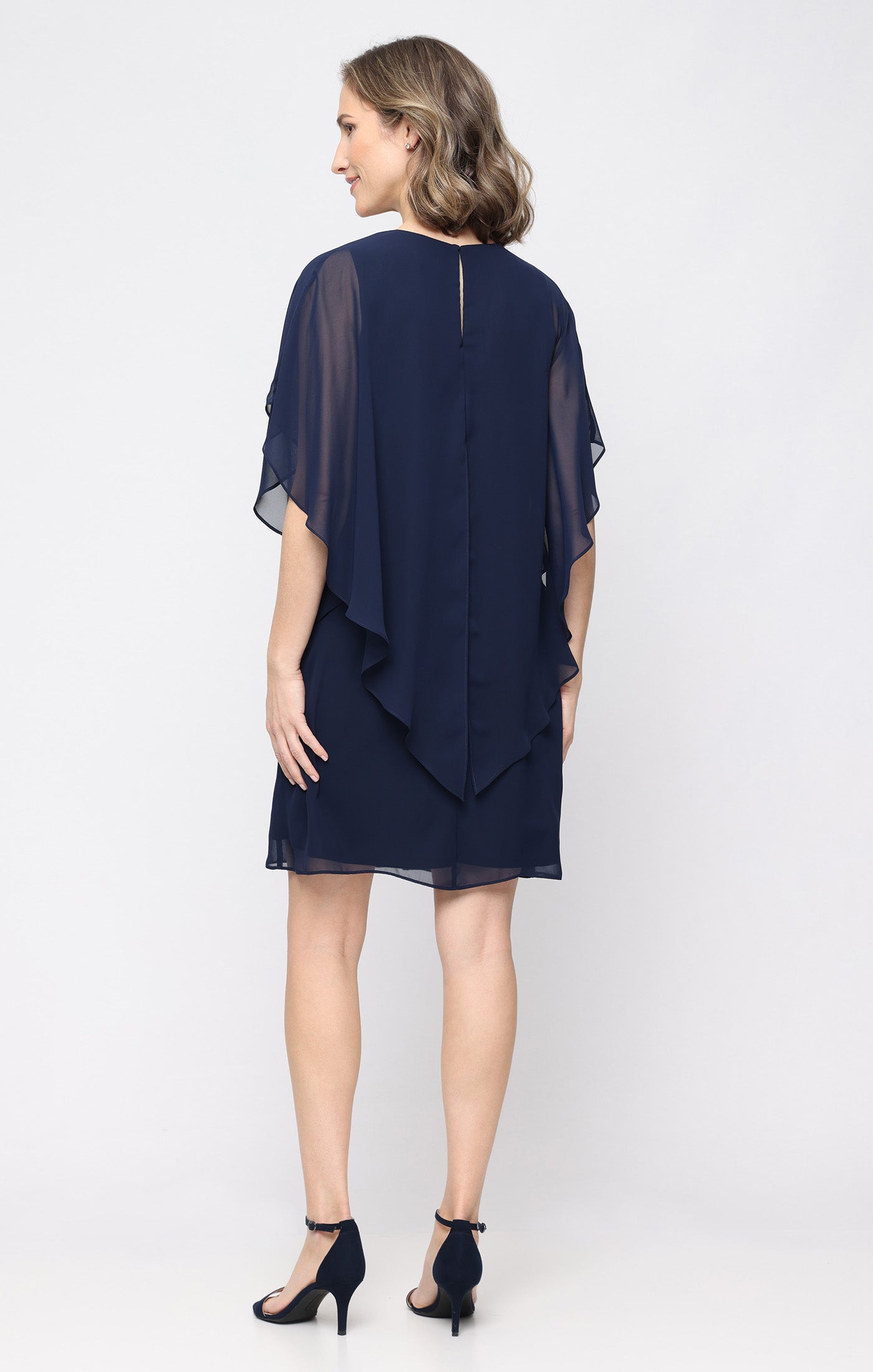 Short Shift Dress With Embellished Cutout Neckline and Capelet Cascade Sleeves