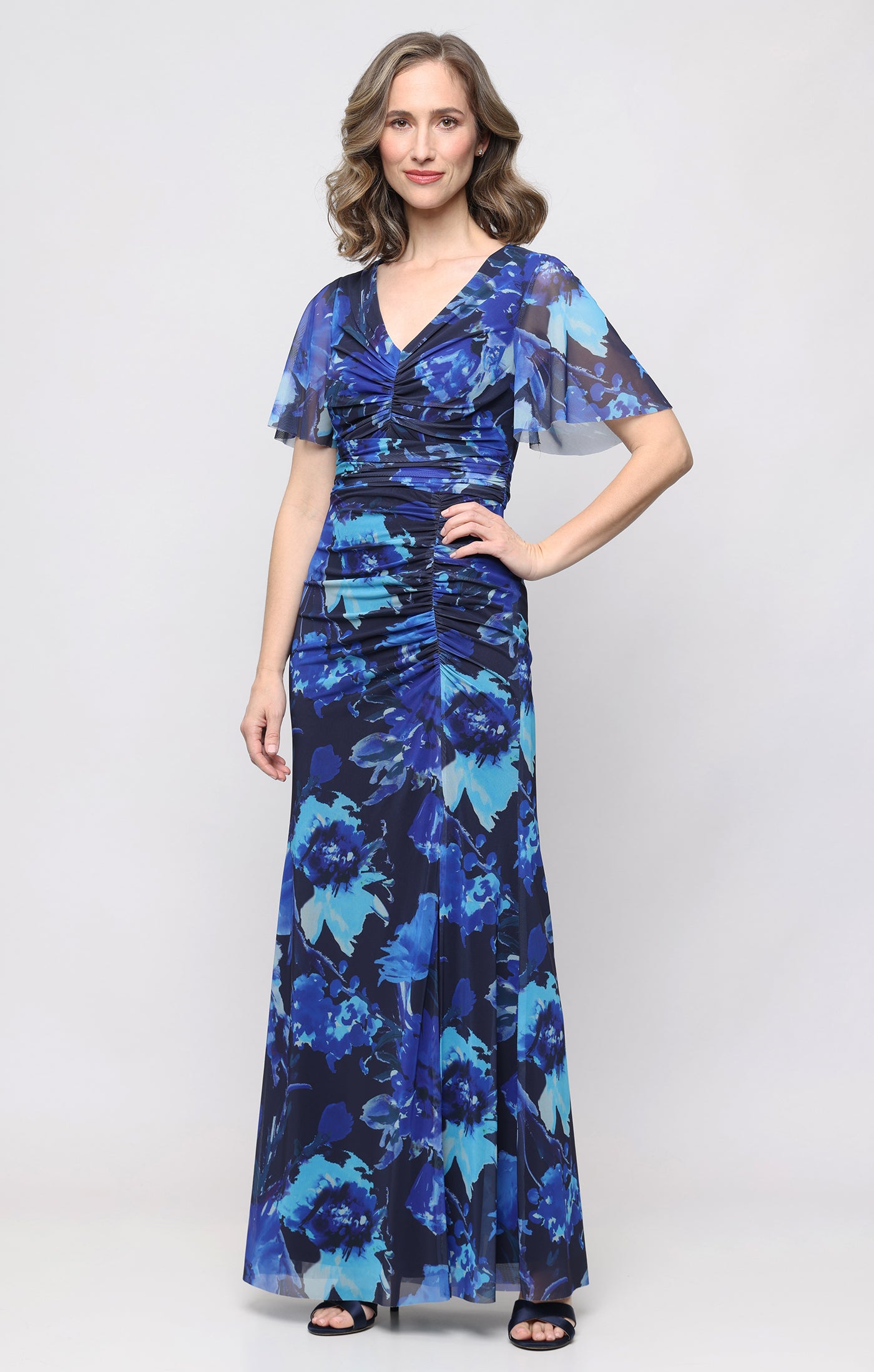 Long Printed Mesh V-Neckline Dress with Ruched Waist Detail and Flutter Sleeves