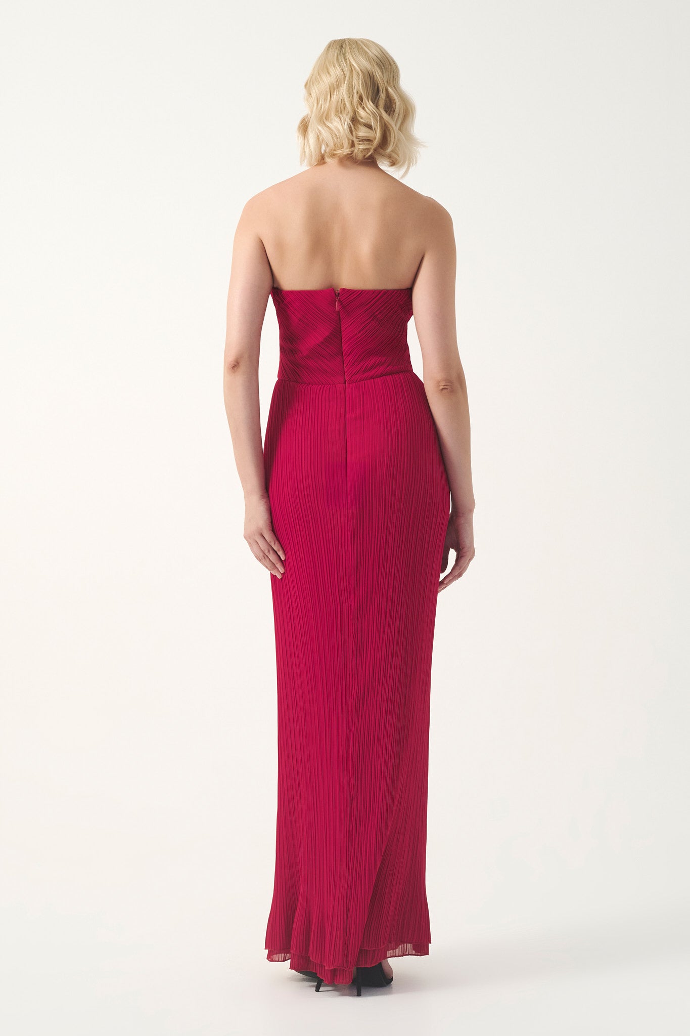 Strapless pleated gown with wrapped bodice