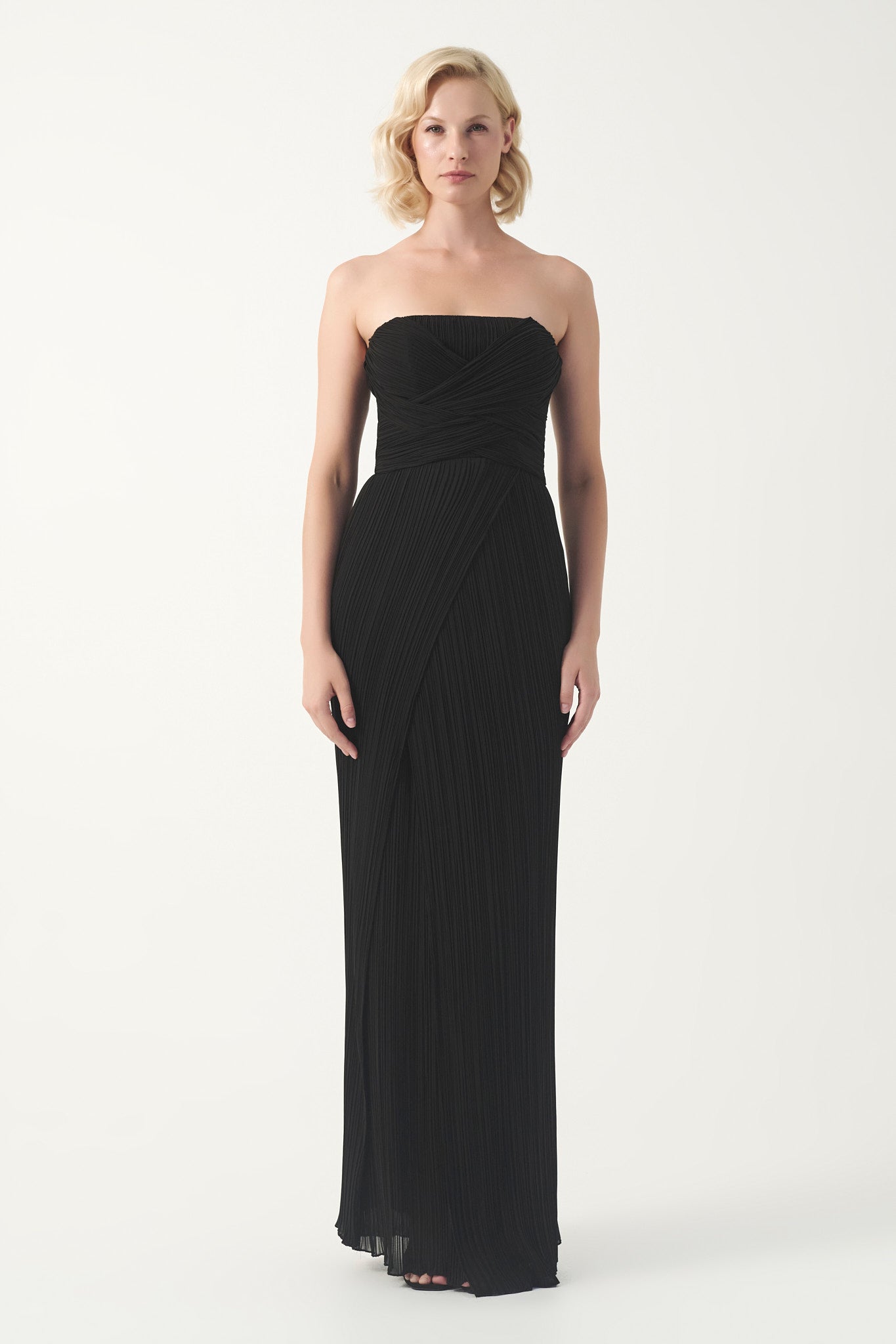 Strapless pleated gown with wrapped bodice